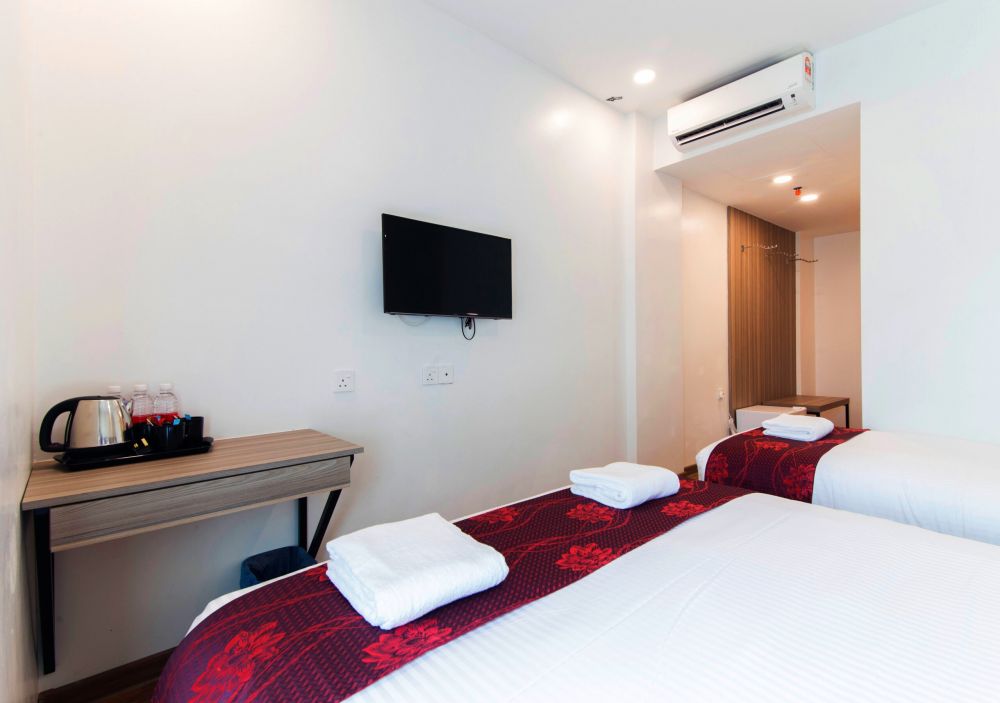 Deluxe Triple Room, Signature International Hotel China Town 3*